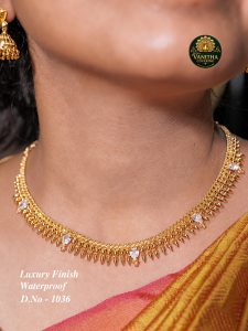 Premium gold plated mullai flower with thilagam ad stone necklace